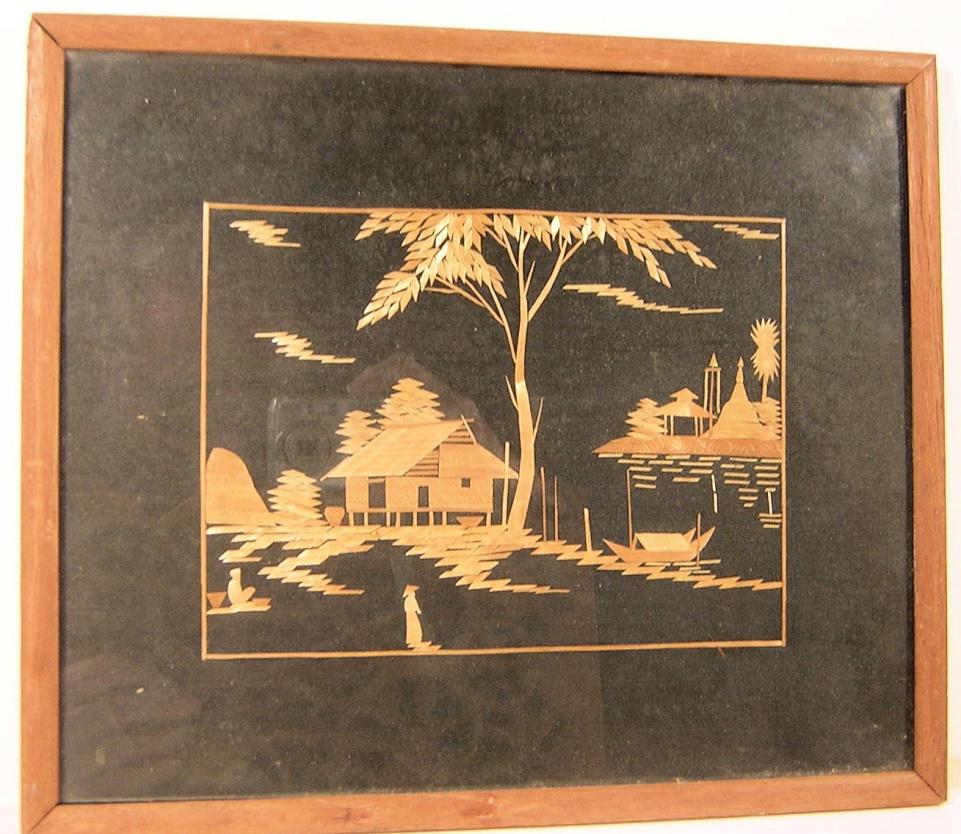 Straw picture of village scene with teak frame and glass-image